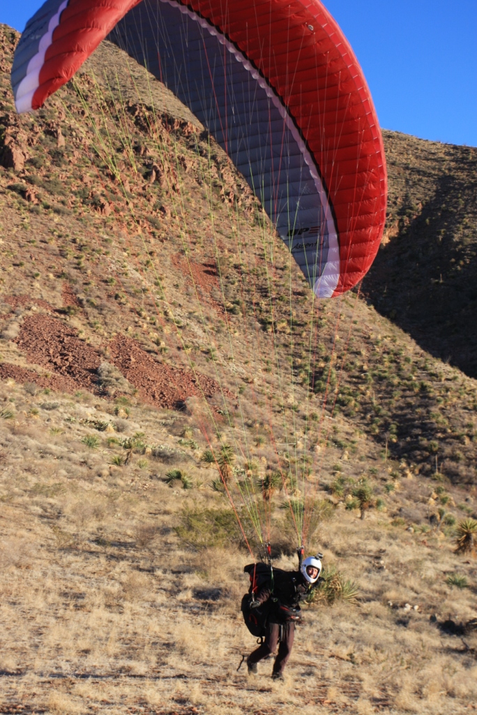 paraglider launching from Agave Hill