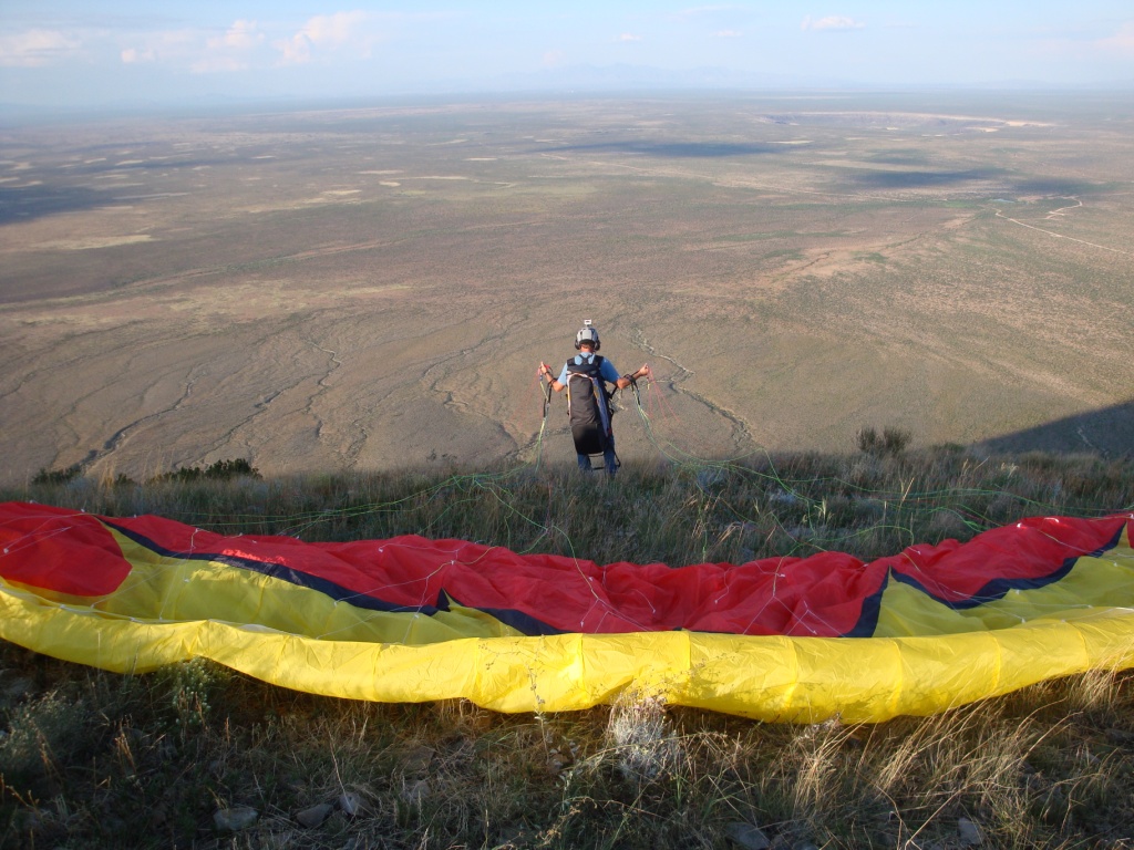 paraglider launching from Mt Riley, Dona Ana County, New Mexico