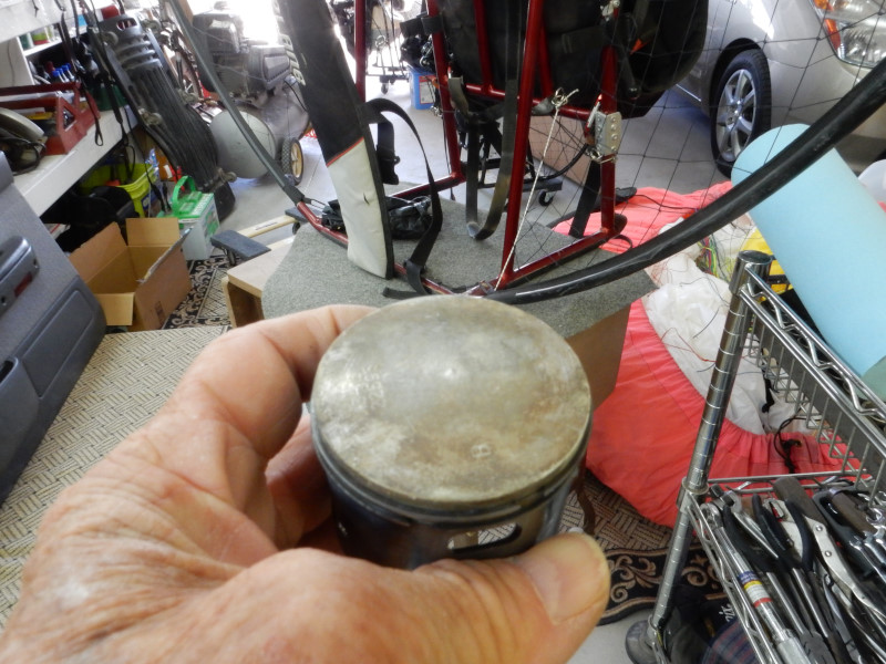 piston top cleaned of lead phosphate deposits