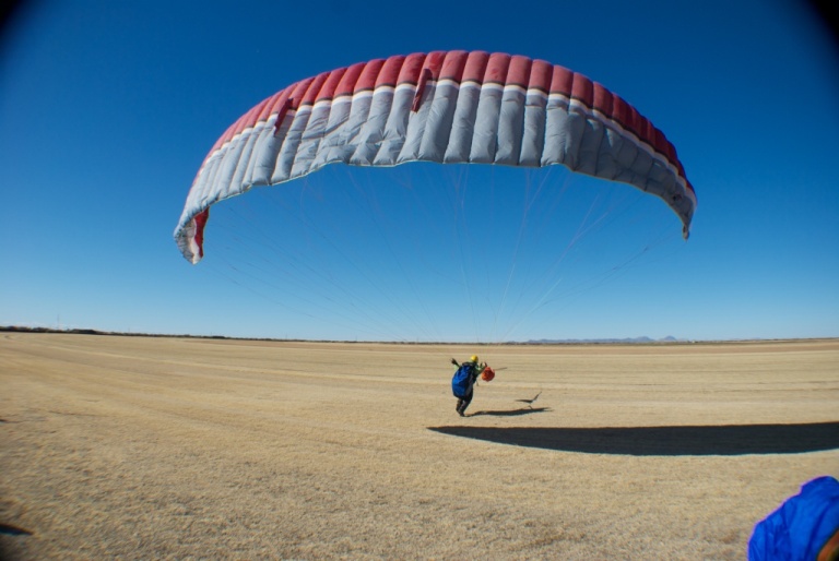 paraglider preparing to be towed up